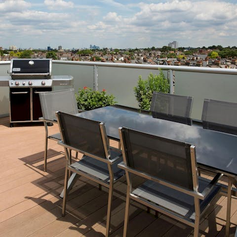 Light the barbecue and relax on the rooftop terrace