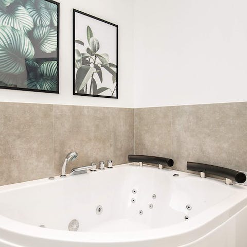 End each day with a soothing soak in the jacuzzi bath