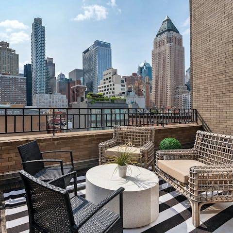 Sip coffee on the private terrace as you drink in the city views
