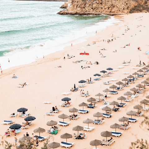 Grab your towel and spend the afternoon at Praia da Oura beach