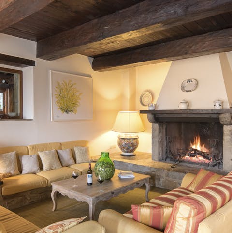 Snuggle up next to the traditional fireplace at the end of a productive day