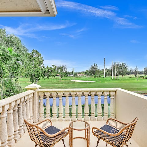 Enjoy a cup of coffee as you sit out on the balcony overlooking the golf course