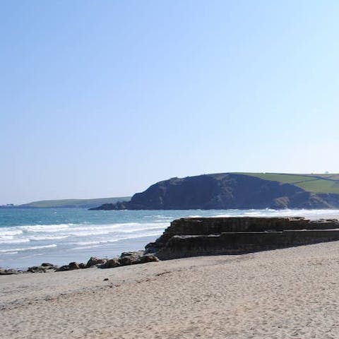 Stretch out on the sand at Pentewan Beach, less than ten minutes away by car