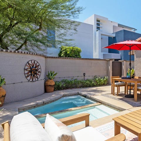 Sink into your pool when the mid-day sun starts to blaze down, and hop into hot tub when the desert air starts to chill