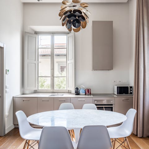 Fire up the coffee machine and get together for lazy breakfasts in the light-filled kitchen space