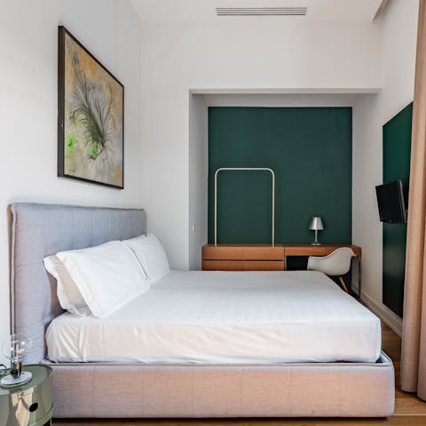 Catch up on emails from the quiet desk area in the bedroom