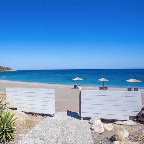 Walk down the garden path for private access to the small beach