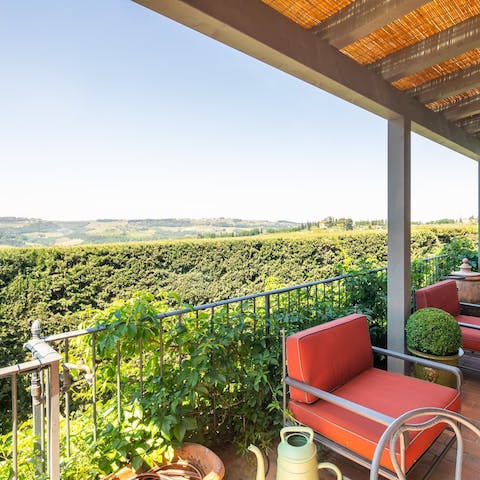 Admire the view of the Pesa river valley from the sunny terrace