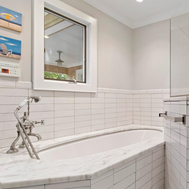 Soak your muscles in the marble tub after a long day of golf