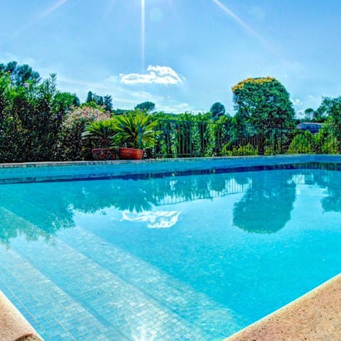 Swim lengths in the private swimming pool after lunch in the local village of Peymeinade 