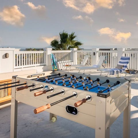 Start a table football competition on the roof