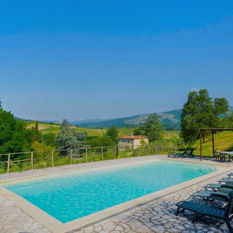 Take your morning swim against the backdrop of Tuscany 