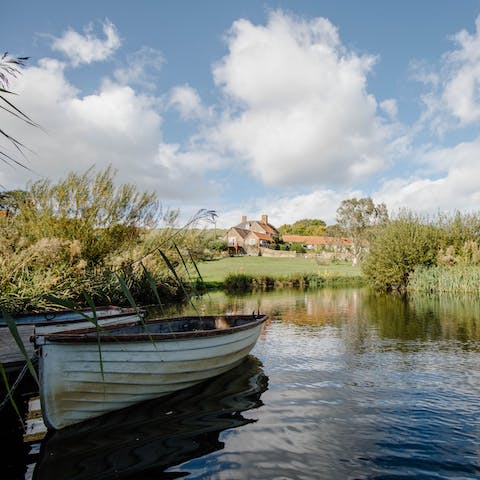 Drift off on the estates rowing boats and meet the resident ducks