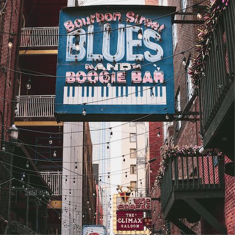 Explore the bustling Bourbon Street, ten minutes away by car