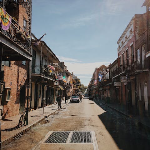 Venture to the storied French Quarter, ten minutes away by car