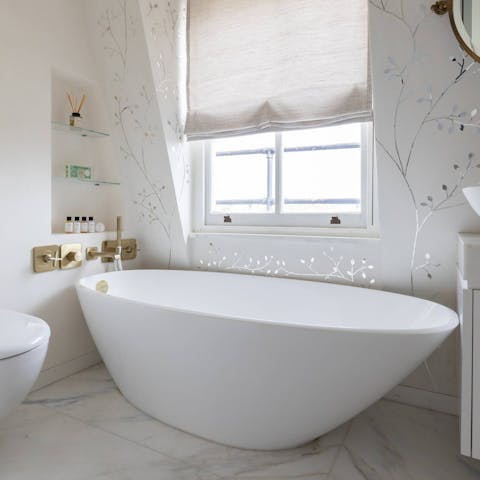 End the evening with a long soak in the en-suite bathtub