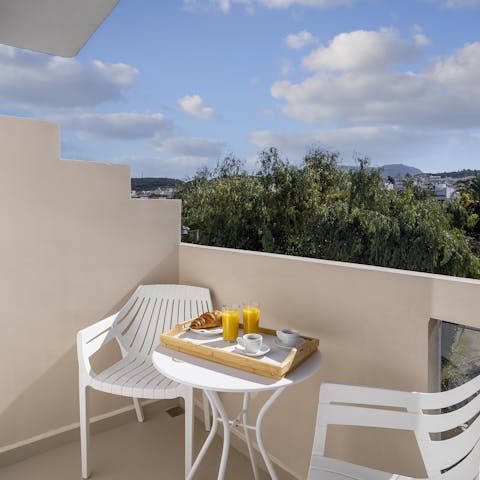 Start mornings with a coffee and a pastry on the private balcony