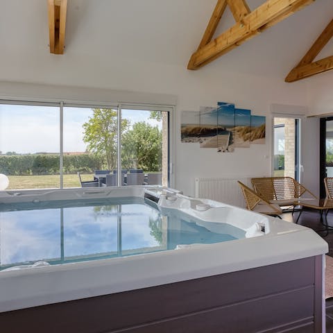 Relax and unwind in the private indoor Jacuzzi 