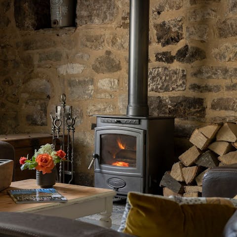 Curl up on the sofa in front of the wood burning fire with a mug of hot chocolate