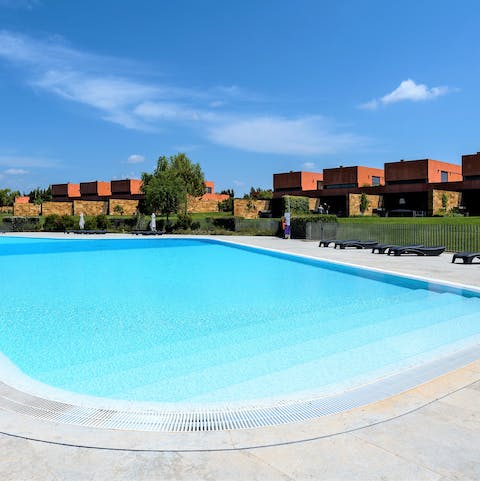 Cool off from the summer sun in the communal swimming pool 