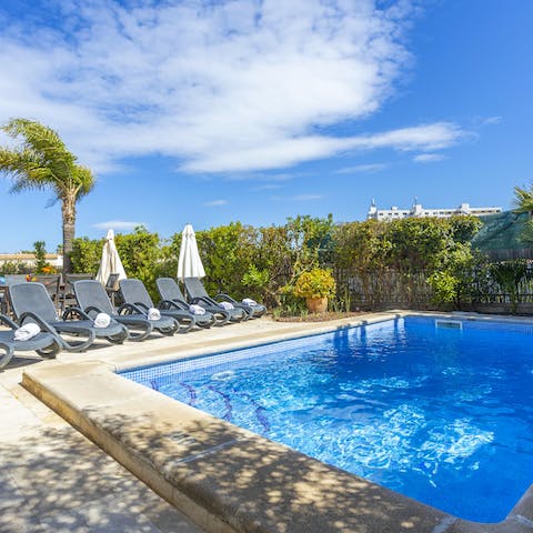 Lounge in the sun or take a refreshing dip in the glistening pool 
