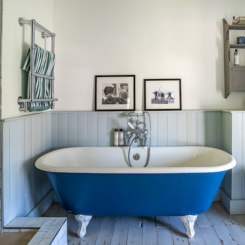 Treat yourself to a luxurious bubble bath in the clawfoot tub