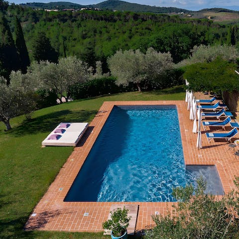 Soak up the panoramic views of the Tuscan hills from the pool
