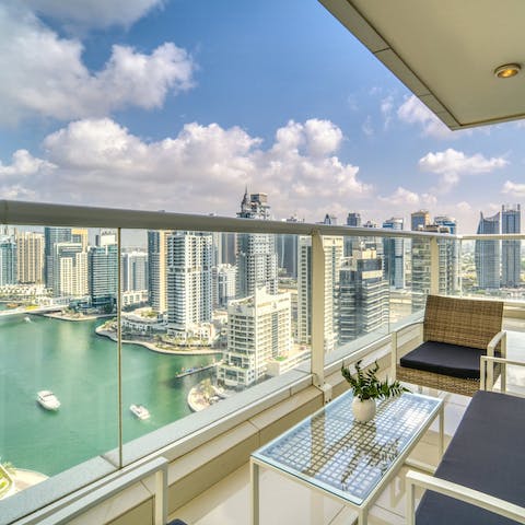 Sip coffee as you gaze out at Dubai Marina from the private balcony