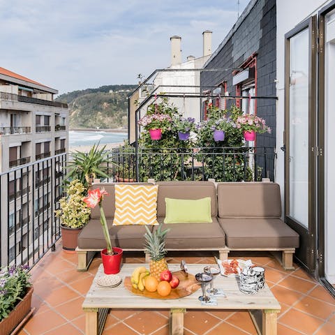 Relax on the private balcony with a glass of Cava
