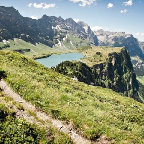 Hike or bike through the Swiss Alps in the summertime 