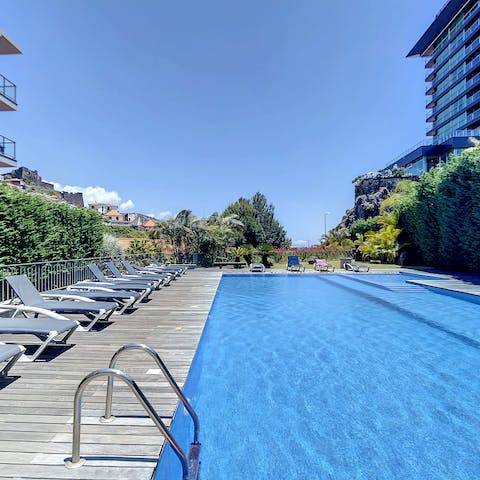 Dive into the shared swimming pool for a refreshing morning dip