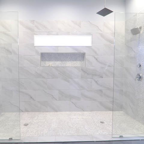 Relax in the luxurious walk-in rain shower