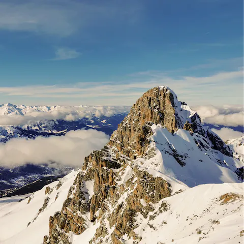 Explore the snow-capped peaks and winding valleys of Courchevel
