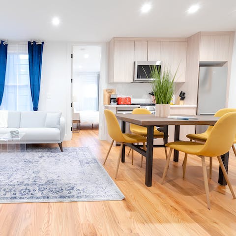 Share a meal together in the open kitchen and dining area