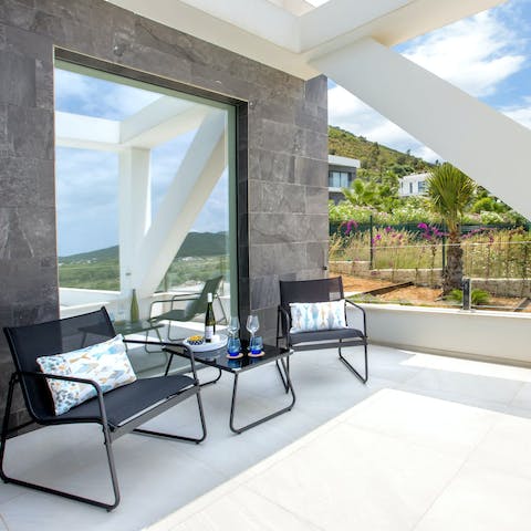 Open a bottle of wine and watch a sunset from the balcony