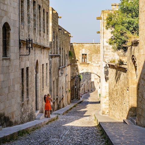 Wander the old streets of historic Rhodes – only a fifteen-minute drive from the home