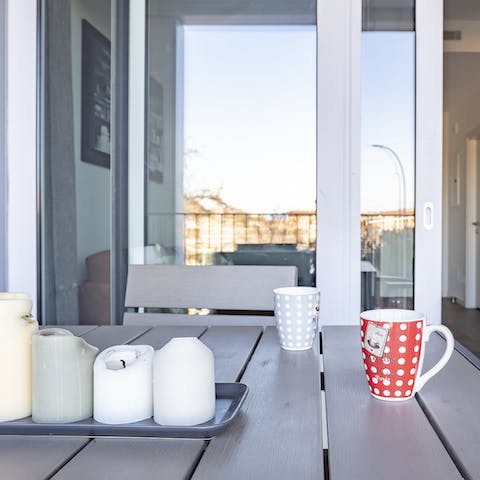 Enjoy morning coffee out on the balcony