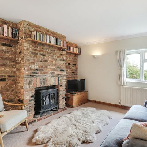 Spend cosy evenings reading or watching movies by the fire 