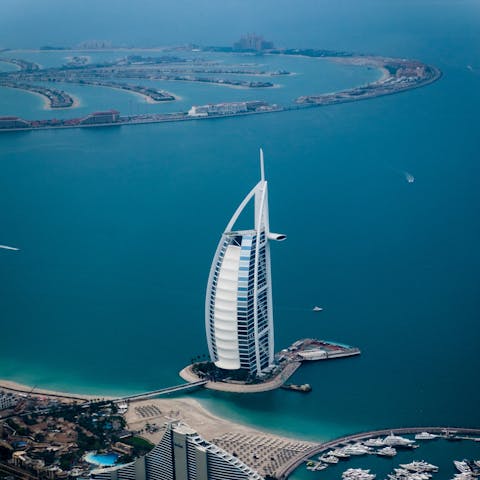 Explore iconic Dubai, home to skyscrapers, white sand beaches, and unparalleled luxury