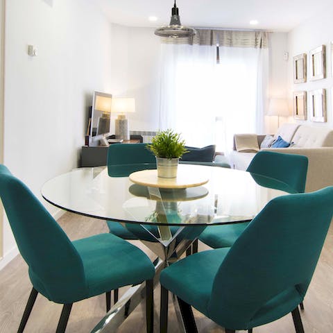 Share your family meals at the glass dining table