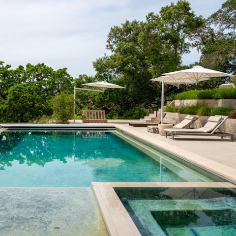 Cool off the private pool or take a dip in the hot tub