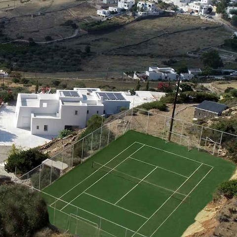 Get in your daily exercise on your private tennis court