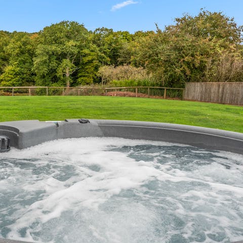 Enjoy the great outdoors from the comfort of the hot tub 
