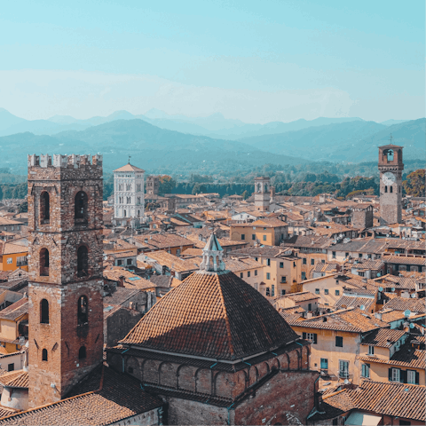 Explore Lucca, a twenty-minute drive away