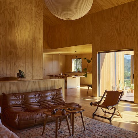 Gather in the mid-century inspired living area, featured in the NY Times