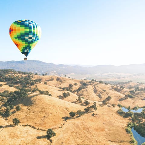 Float serenely over the stunning landscape of the Napa Valley in a hot air balloon