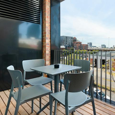 Enjoy some local South African wine on the balcony terrace