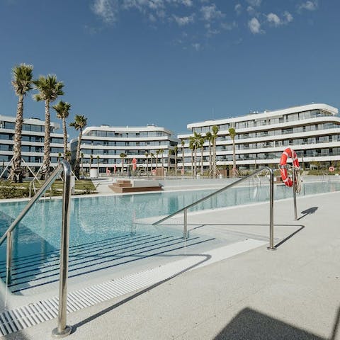 Stroll down to the beach or relax by the communal pool