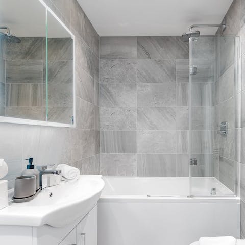 Feel anew in the luxurious en-suite bathroom