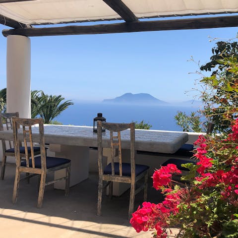 Dine with views out towards the other Aeolian islands